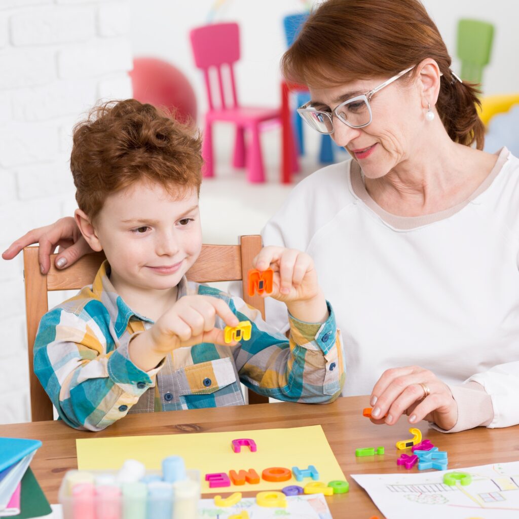 Occupational therapist and little boy
