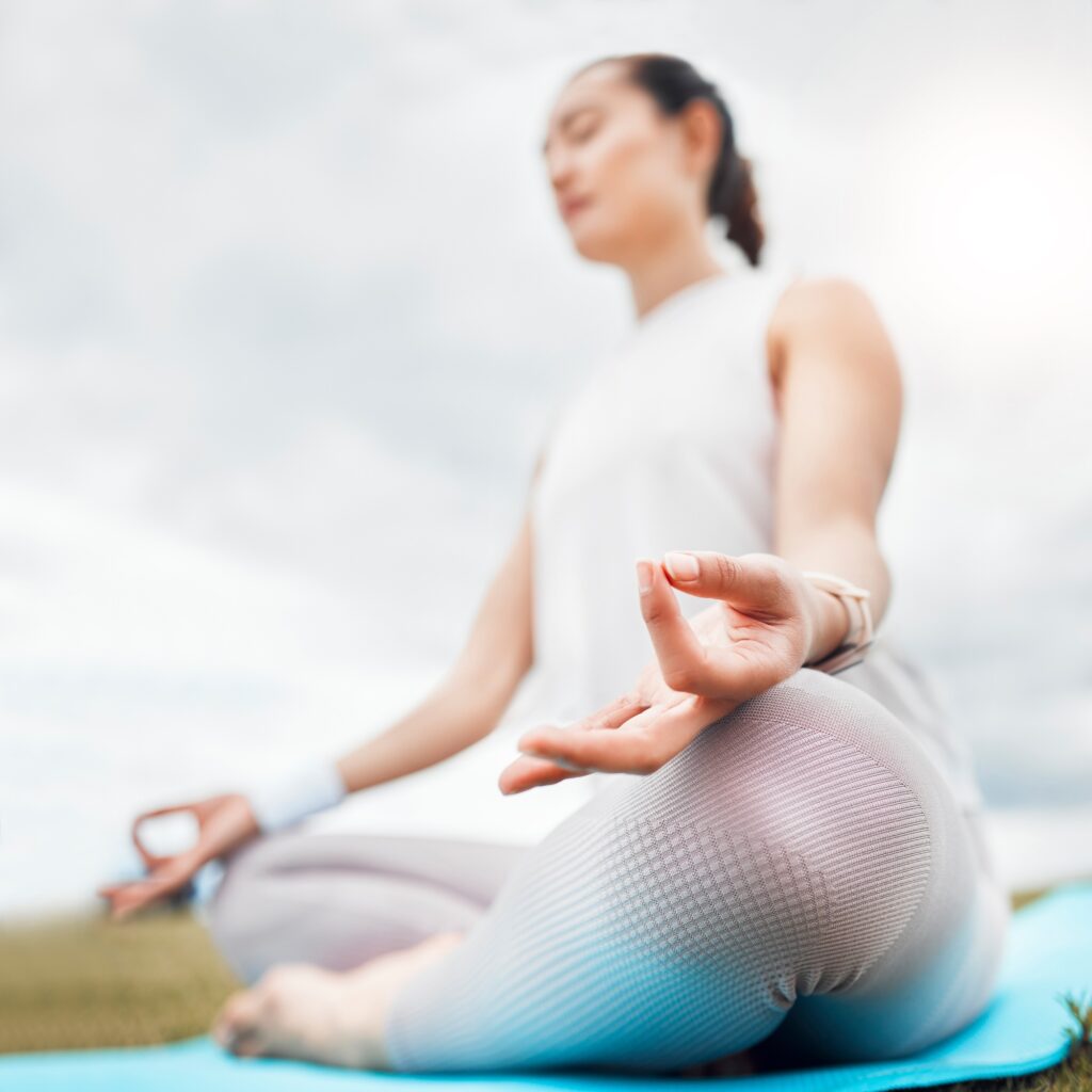 Yoga, woman and lotus meditation in nature for health, mindfulness or wellness. Training, pilates a